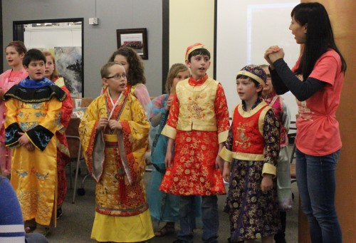 Shanshan Liu with students in costume